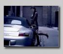 Girl_Flashes_Porsche_911.jpg